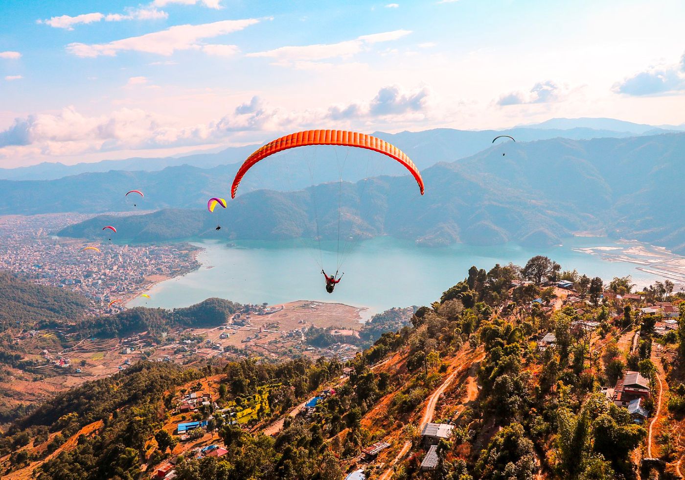 Get Set Globe Discover Prayagraj_ Journey Through the Himalayas_ Discovering Nepal's Natural Wonders-Paragliding in Pokhara